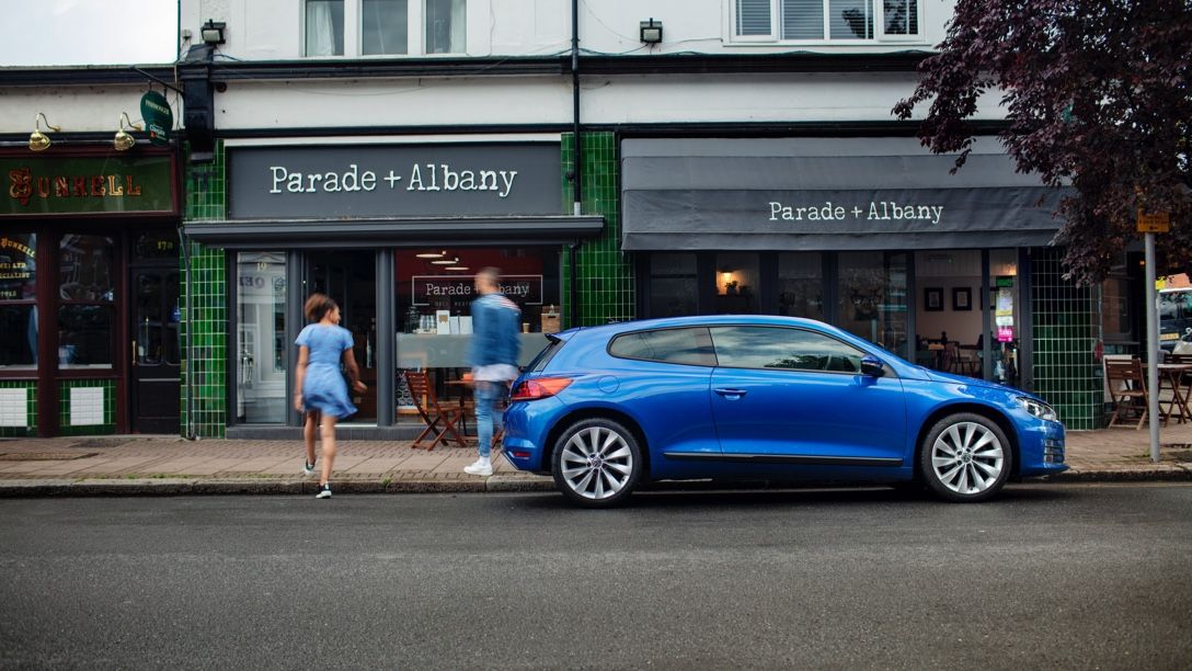 Car parked outside store